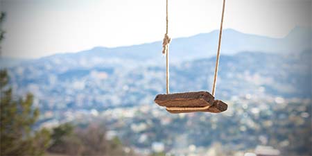 Outdoor swing from wooden plank