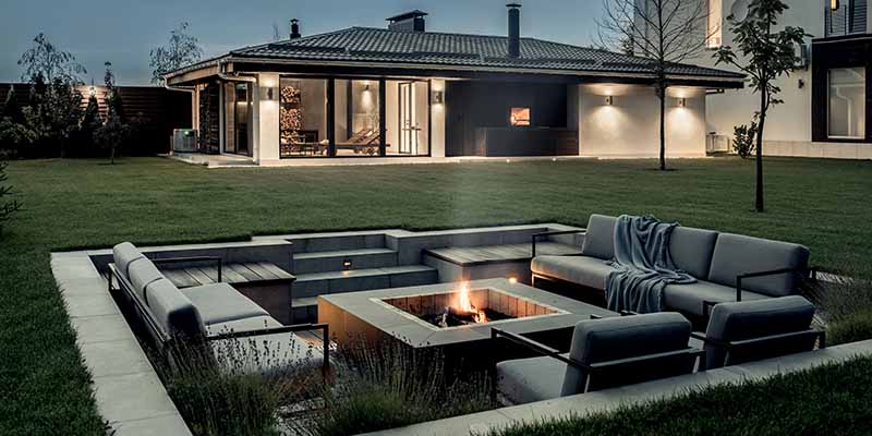 Fire pit on the backyard with a seating area