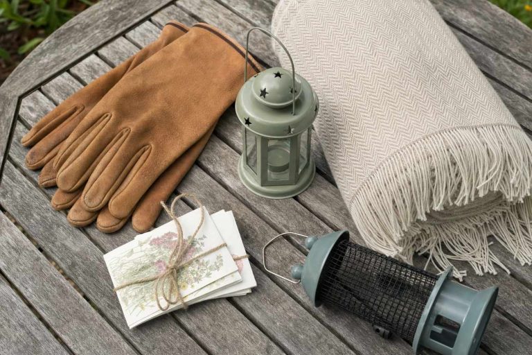 A flat lay of backyard gifts on a wooden garden table